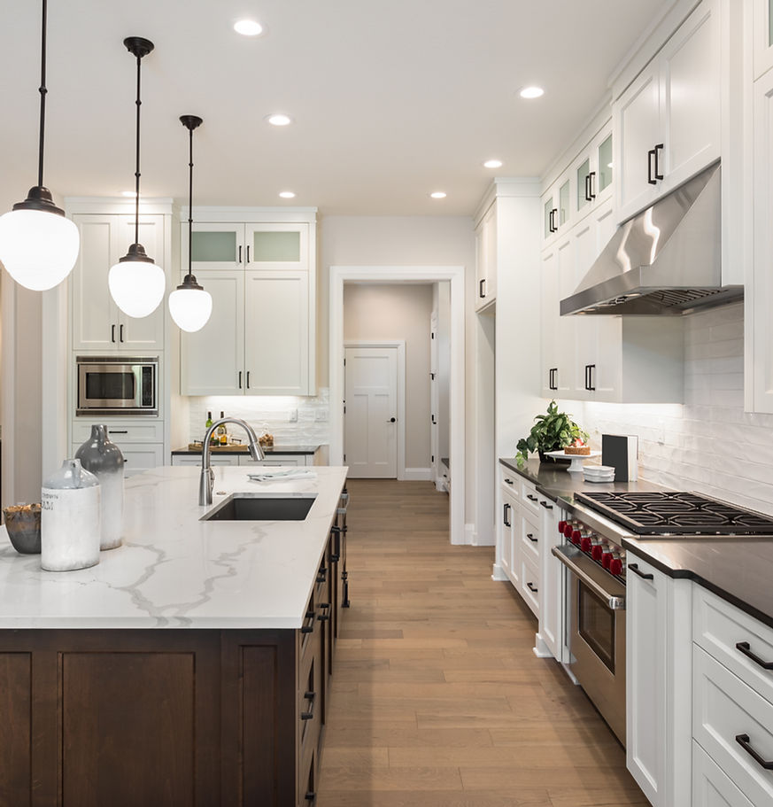 A designed kitchen with wooden floor